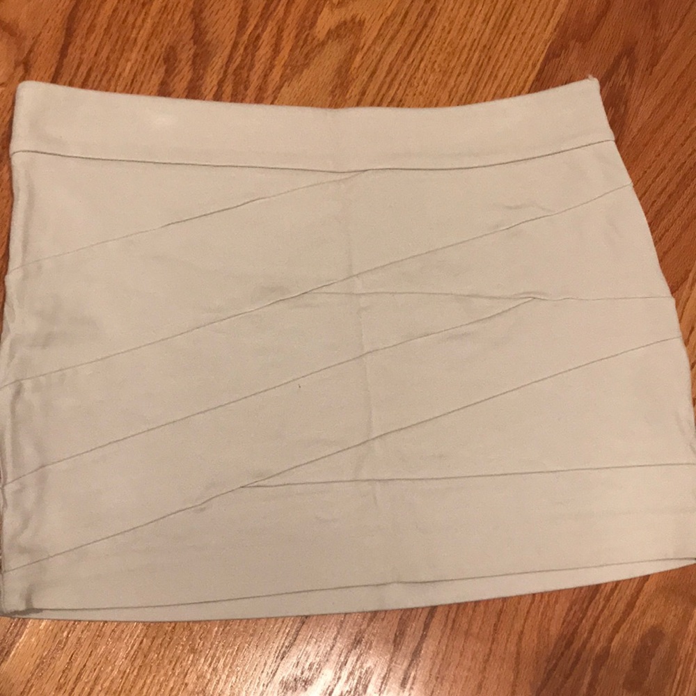 Cream colored fitted stretchy miniskirt, size 8